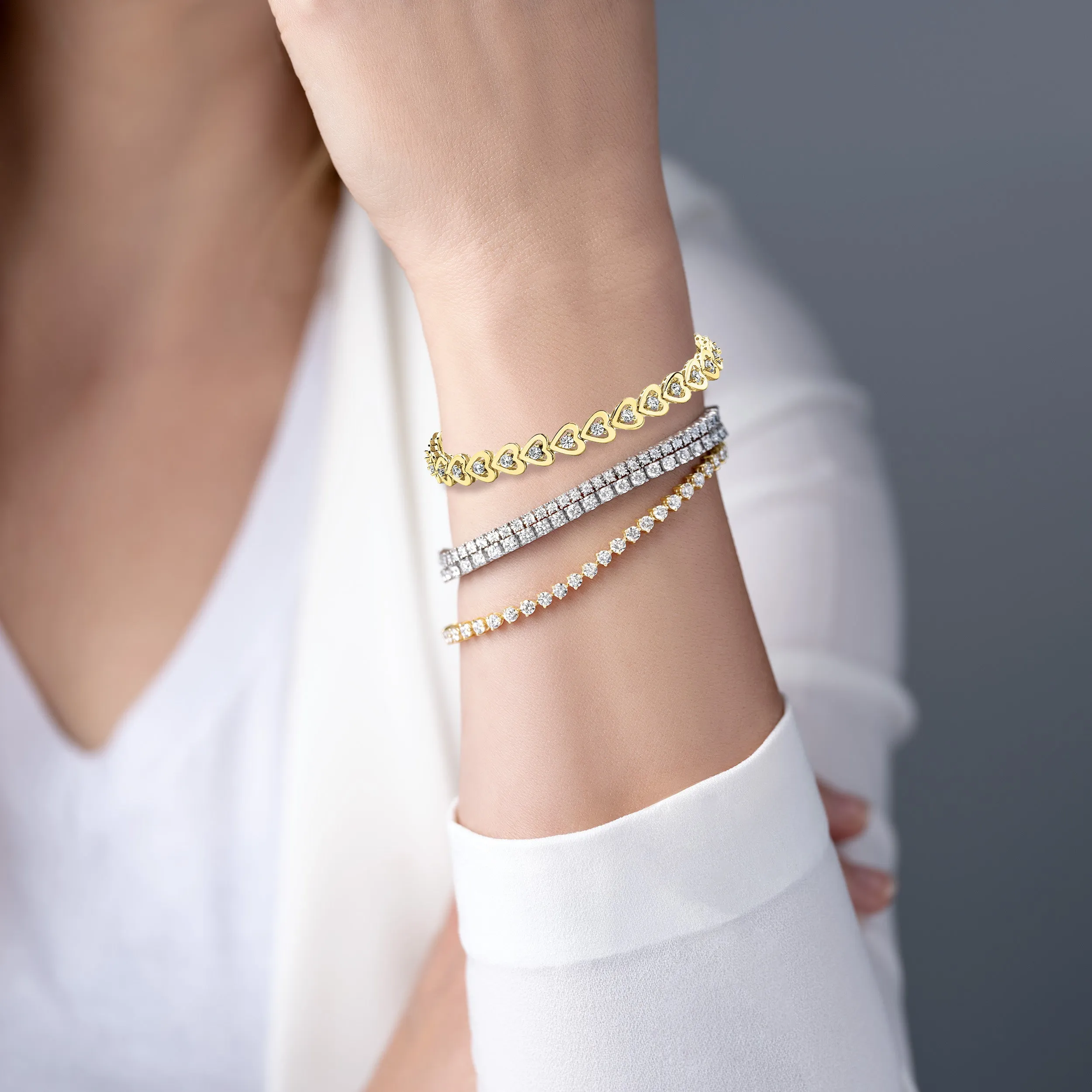 1.50 ctw Round Diamond Hearth Framed Tennis Bracelet