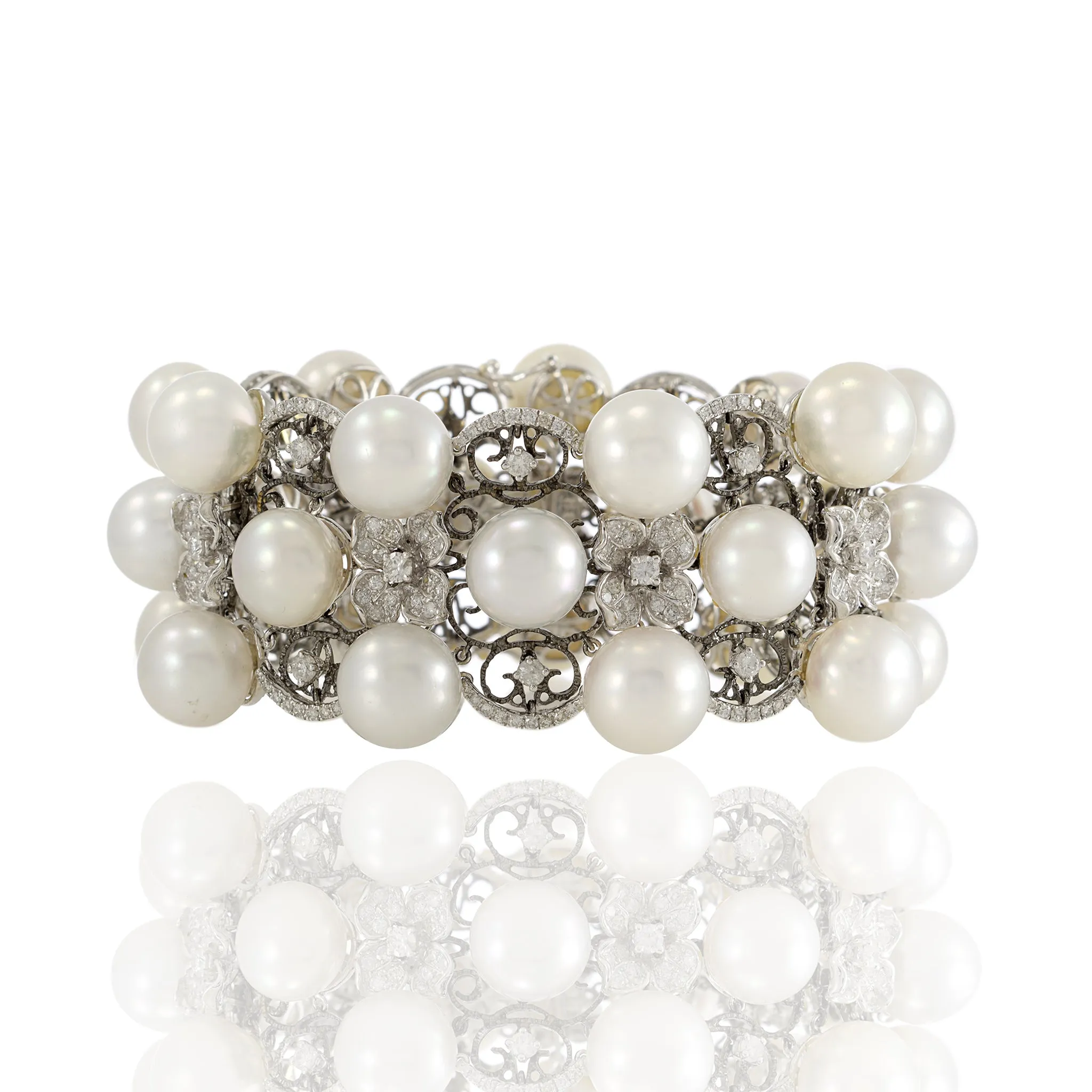 18kt White Gold, South Sea Pearl, and Diamond Three Row Bracelet with Flowers