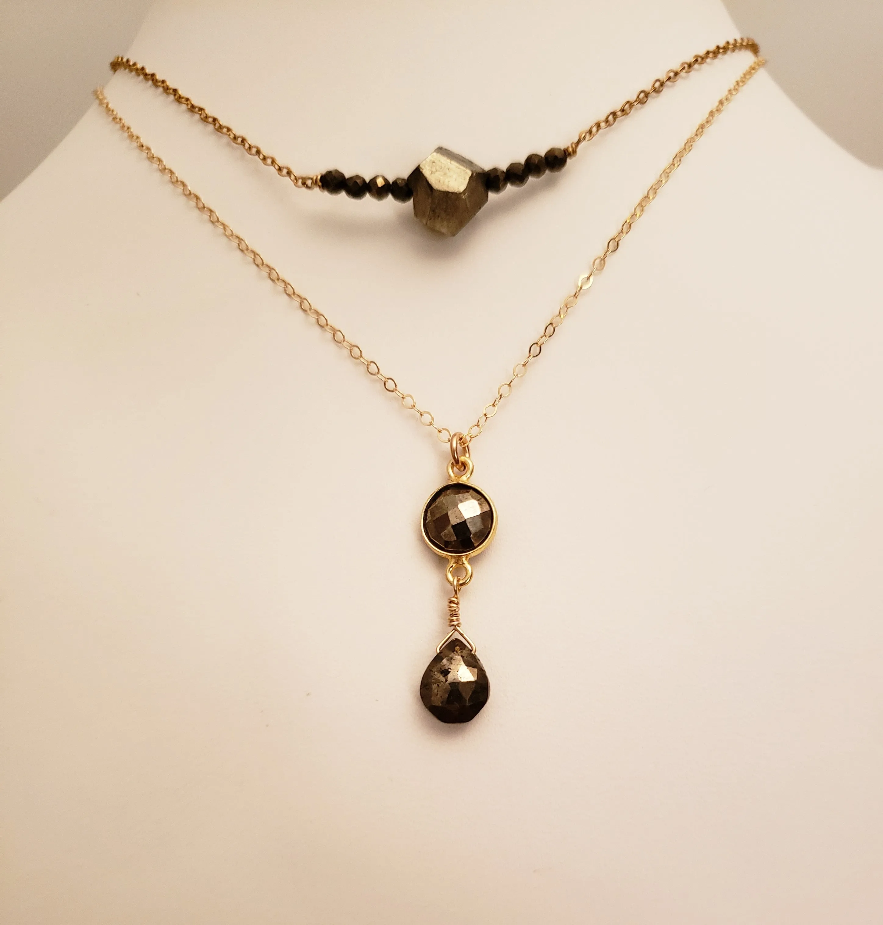 Delicate Pendant Necklace Features a Faceted Bezel Set Pyrite With a Faceted Tear Drop on a Fine Gold Chain.