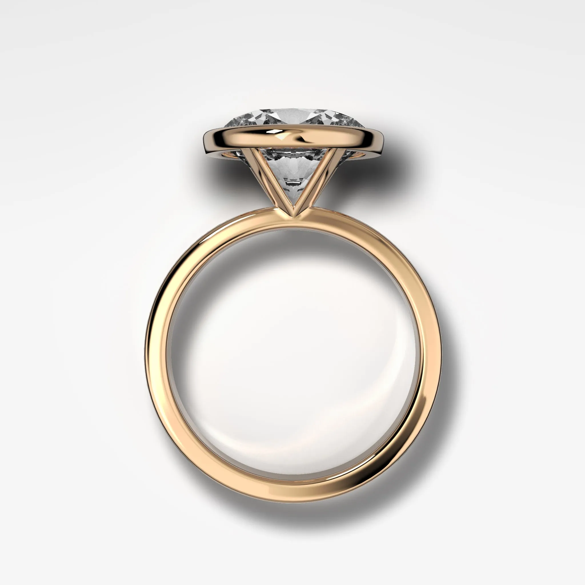 Finest Bezel Set Engagement Ring With East West Oval Cut Diamond