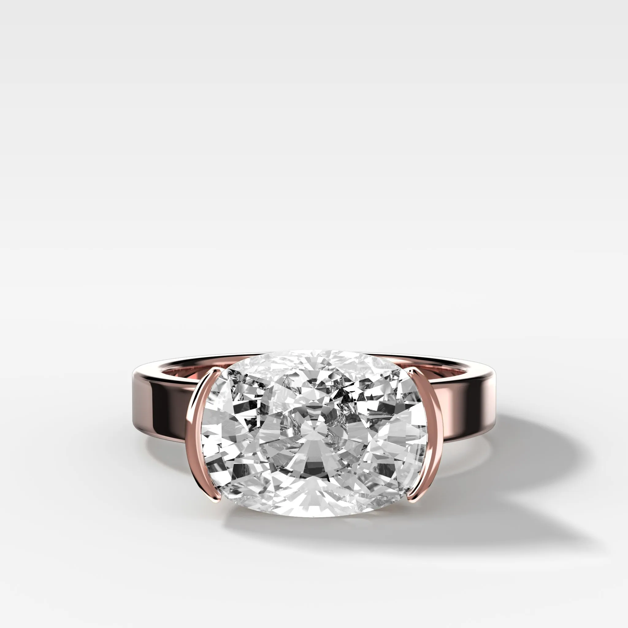 Finest Half Bezel Solitaire Engagement Ring With East West Elongated Cushion Cut Diamond
