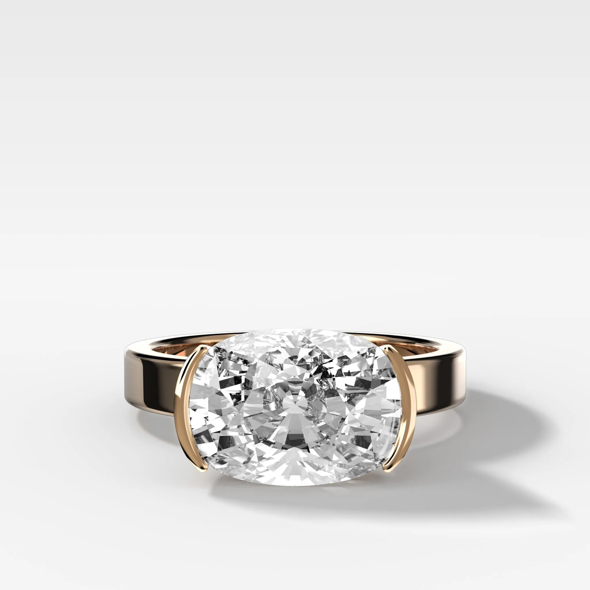 Finest Half Bezel Solitaire Engagement Ring With East West Elongated Cushion Cut Diamond