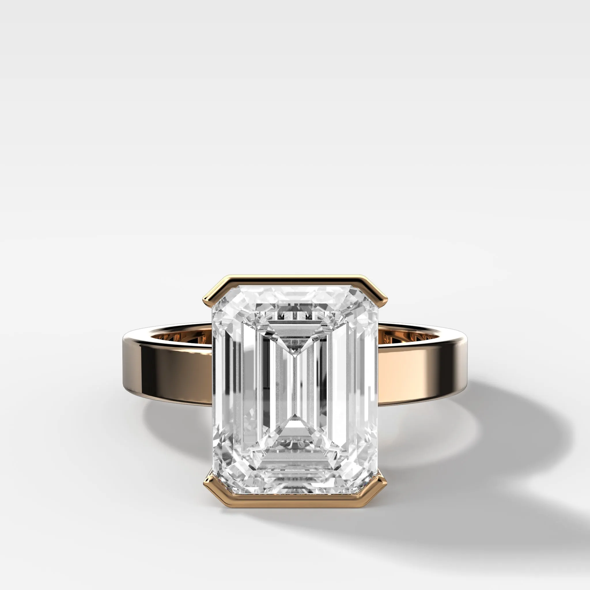 Finest Half Bezel Solitaire Engagement Ring With Emerald Cut Diamond