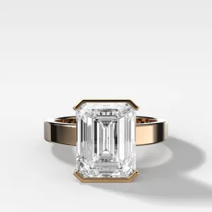 Finest Half Bezel Solitaire Engagement Ring With Emerald Cut Diamond