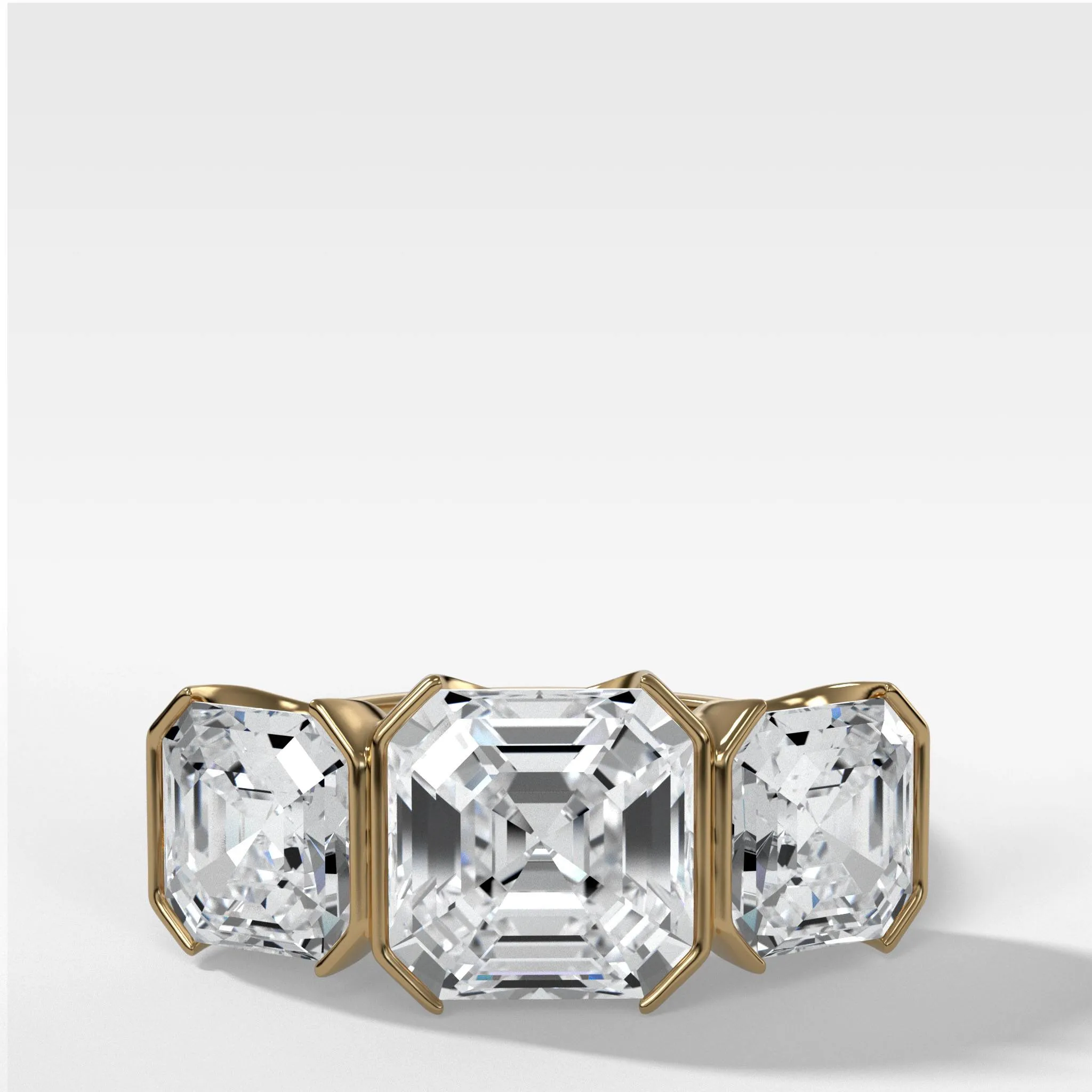 Half Bezel Triad Engagement Ring With Asscher Cut Diamonds