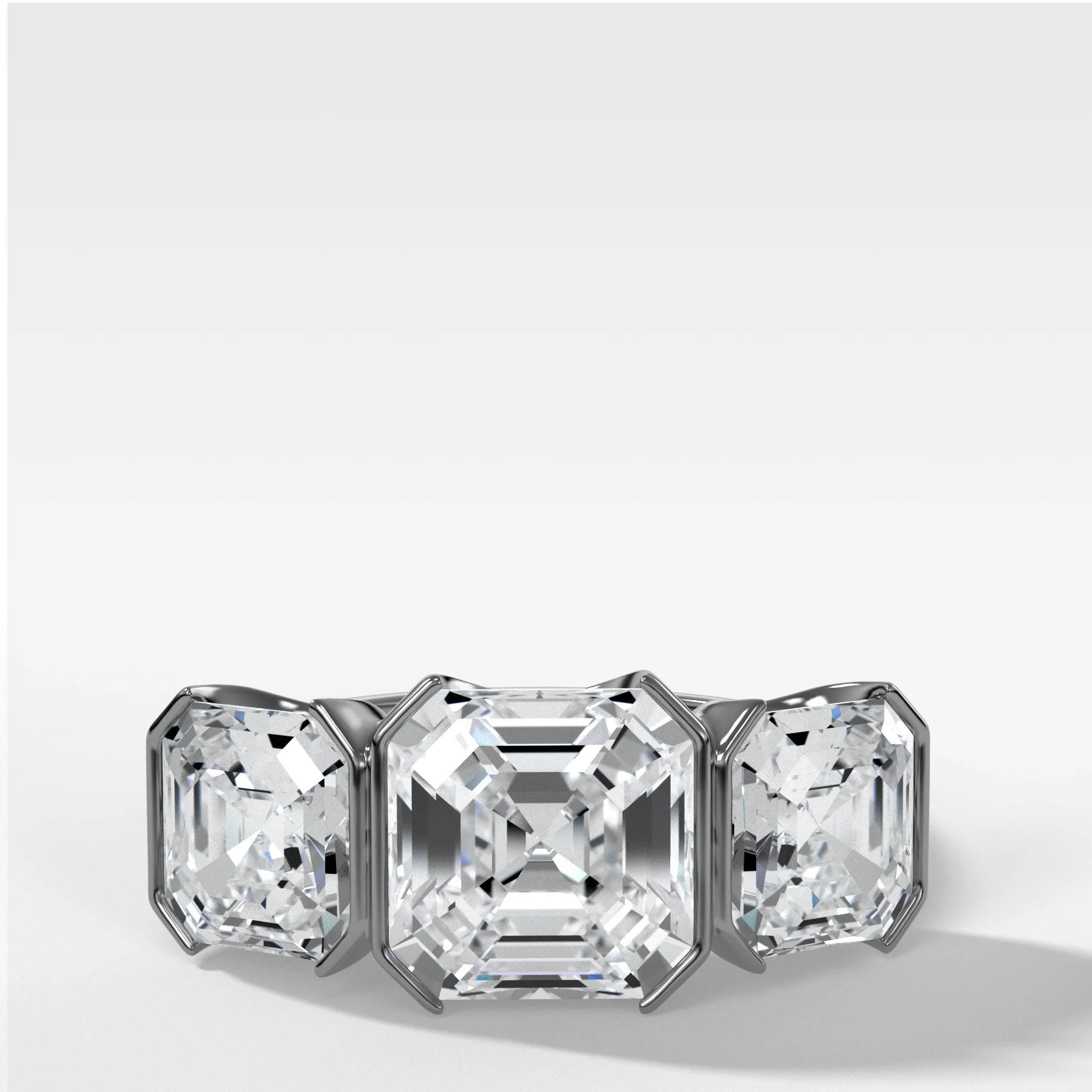 Half Bezel Triad Engagement Ring With Asscher Cut Diamonds
