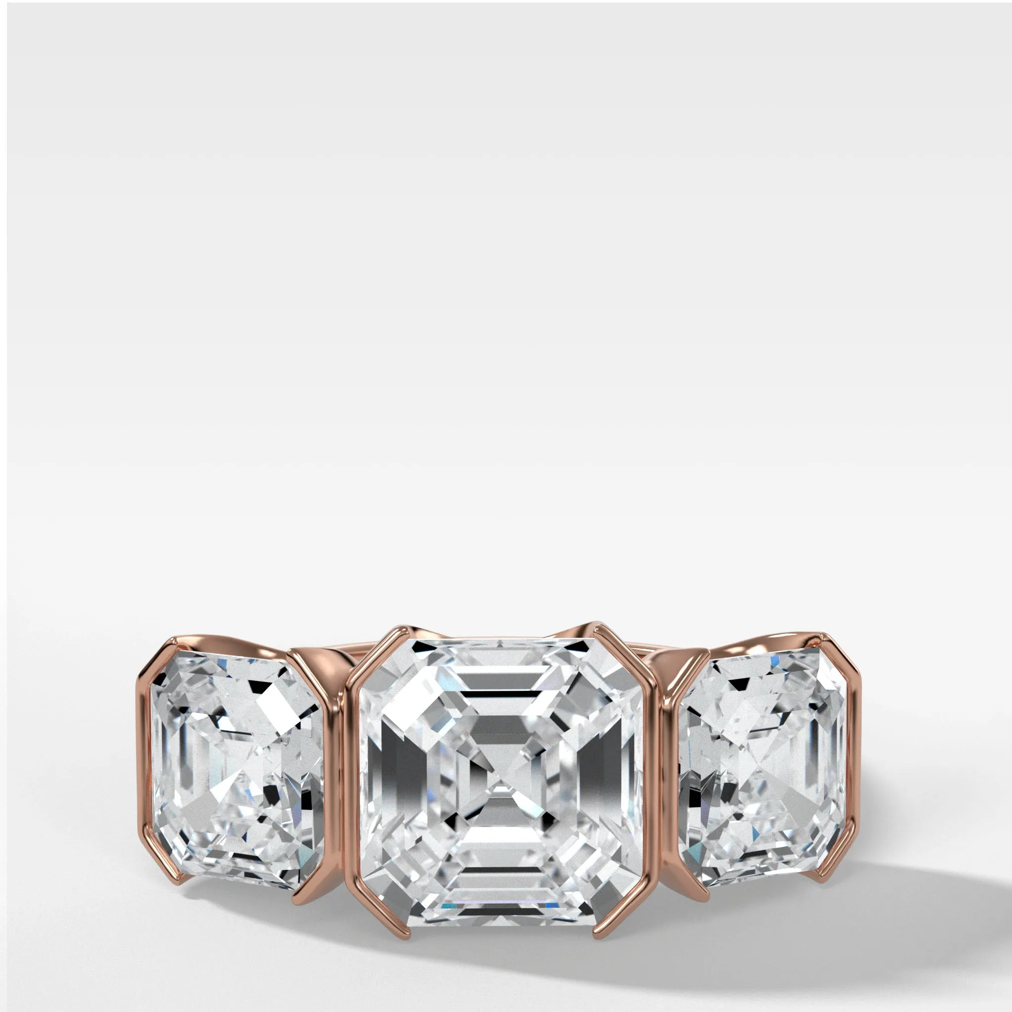 Half Bezel Triad Engagement Ring With Asscher Cut Diamonds