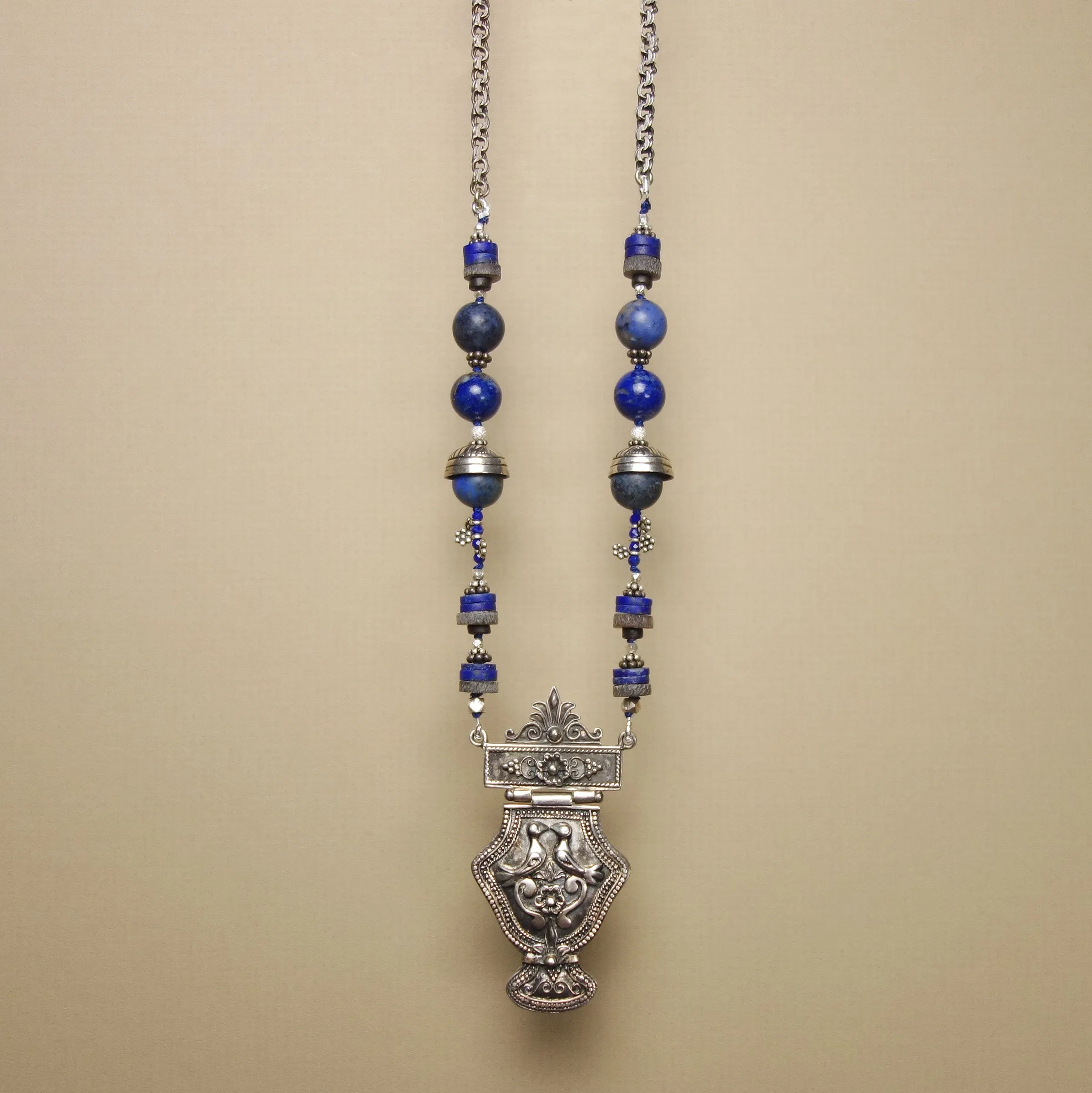 Lifegiving Lovebirds: handmade Greek silver and sapphire