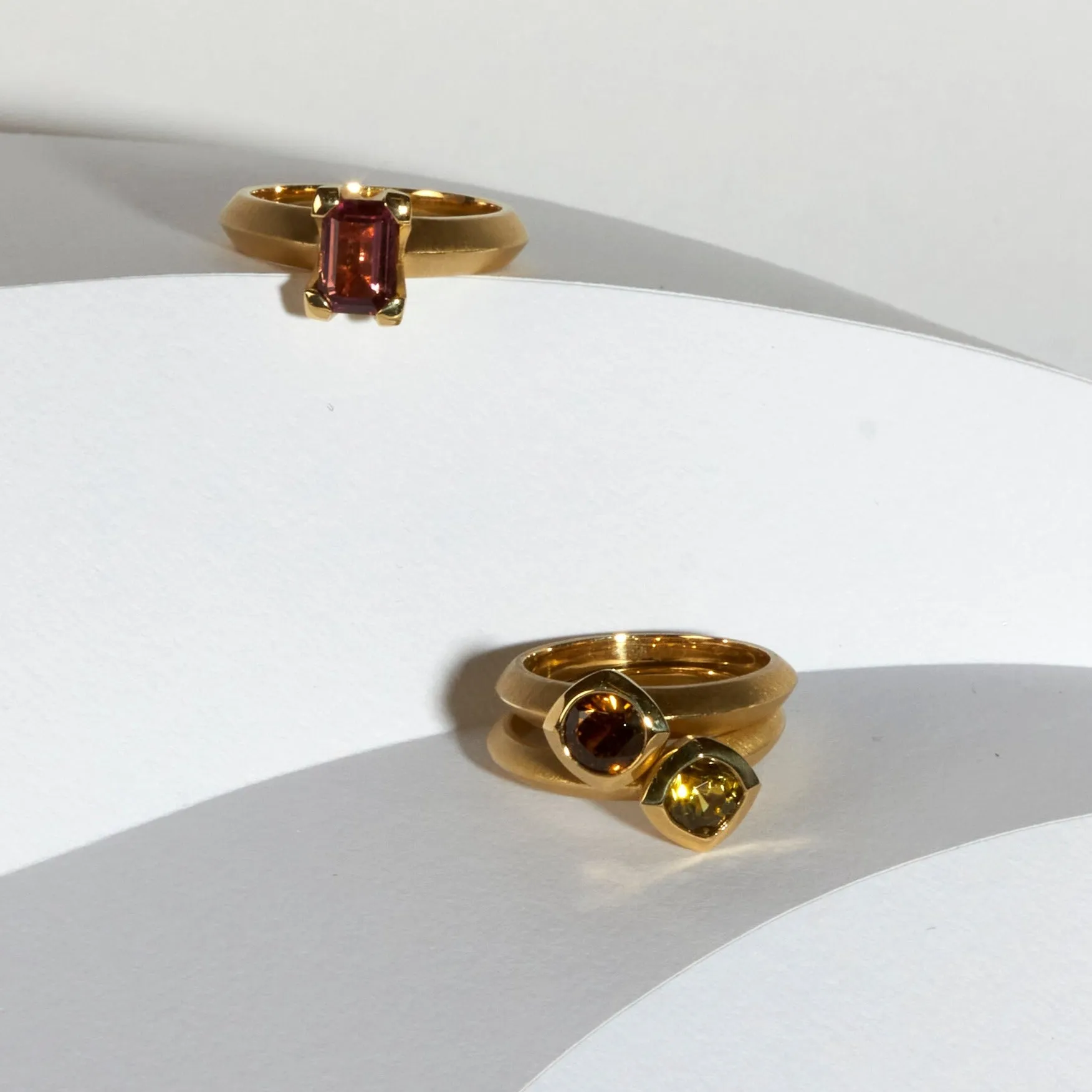 mali garnet bezel set round solitaire