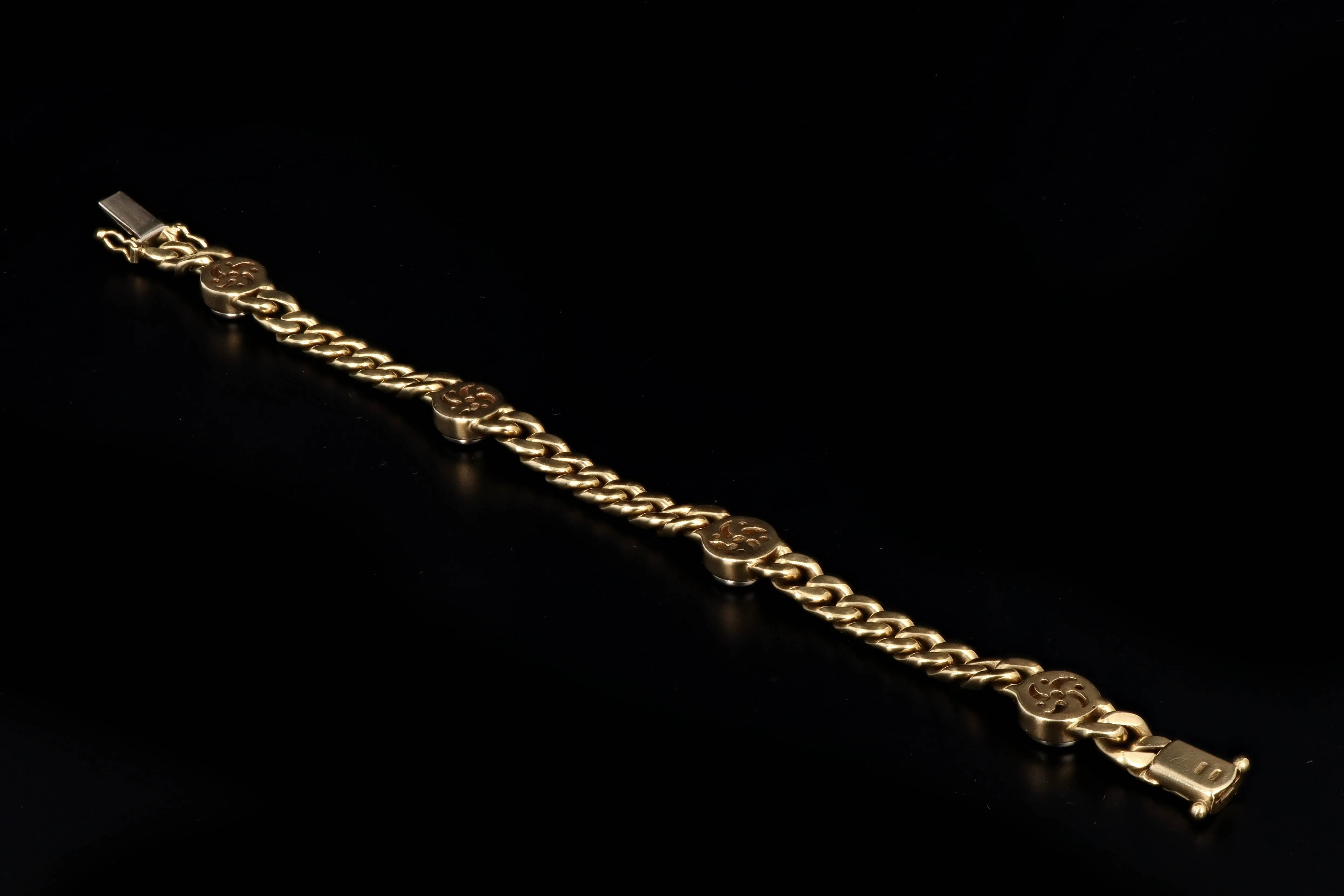 Modern 14K Yellow & White Gold .70 Carats Round Brilliant Cut Diamond Curb Link Bracelet