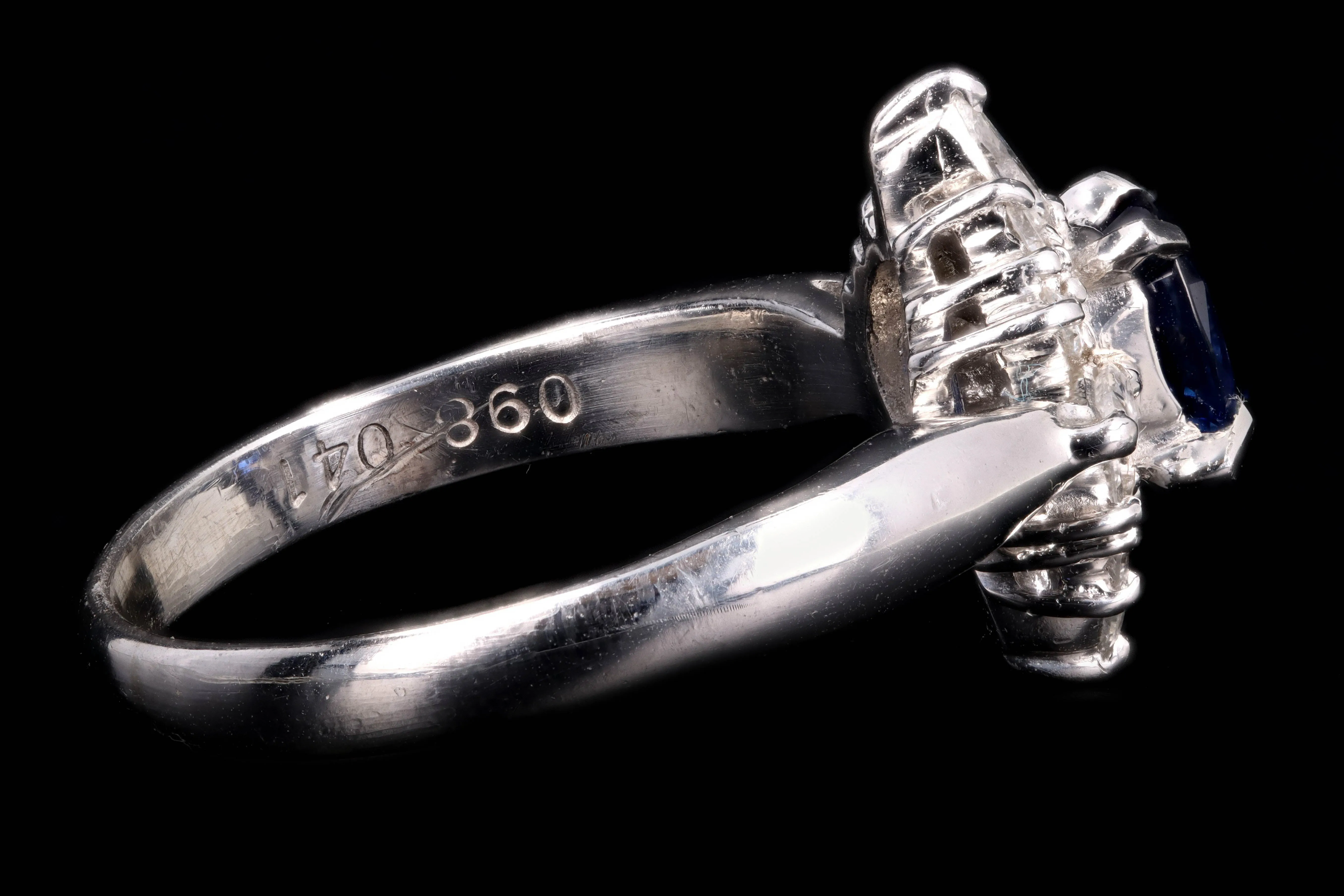 Modern Platinum .98 Carat Oval Cut Sapphire & Diamond Ring