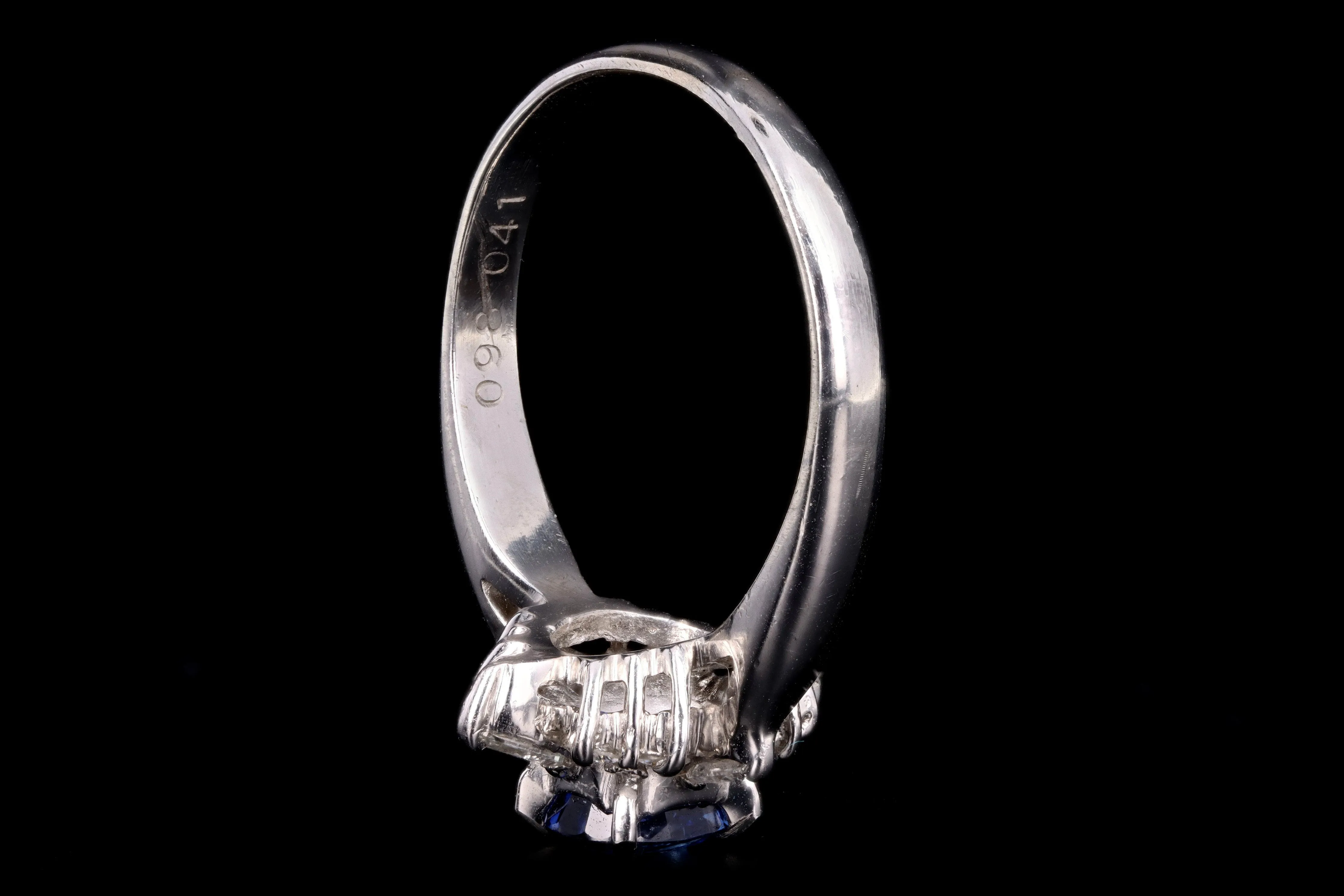 Modern Platinum .98 Carat Oval Cut Sapphire & Diamond Ring