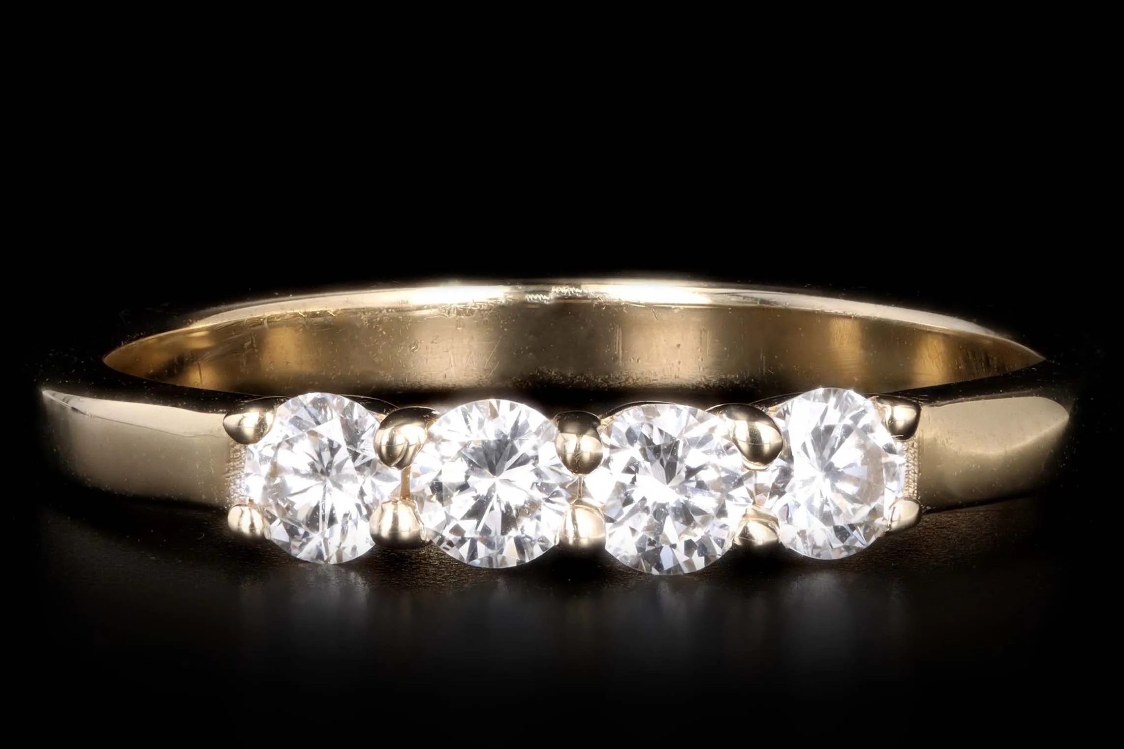 New Platinum or 14K Yellow Gold .45 Carat Total Weight Diamond Four Stone Band