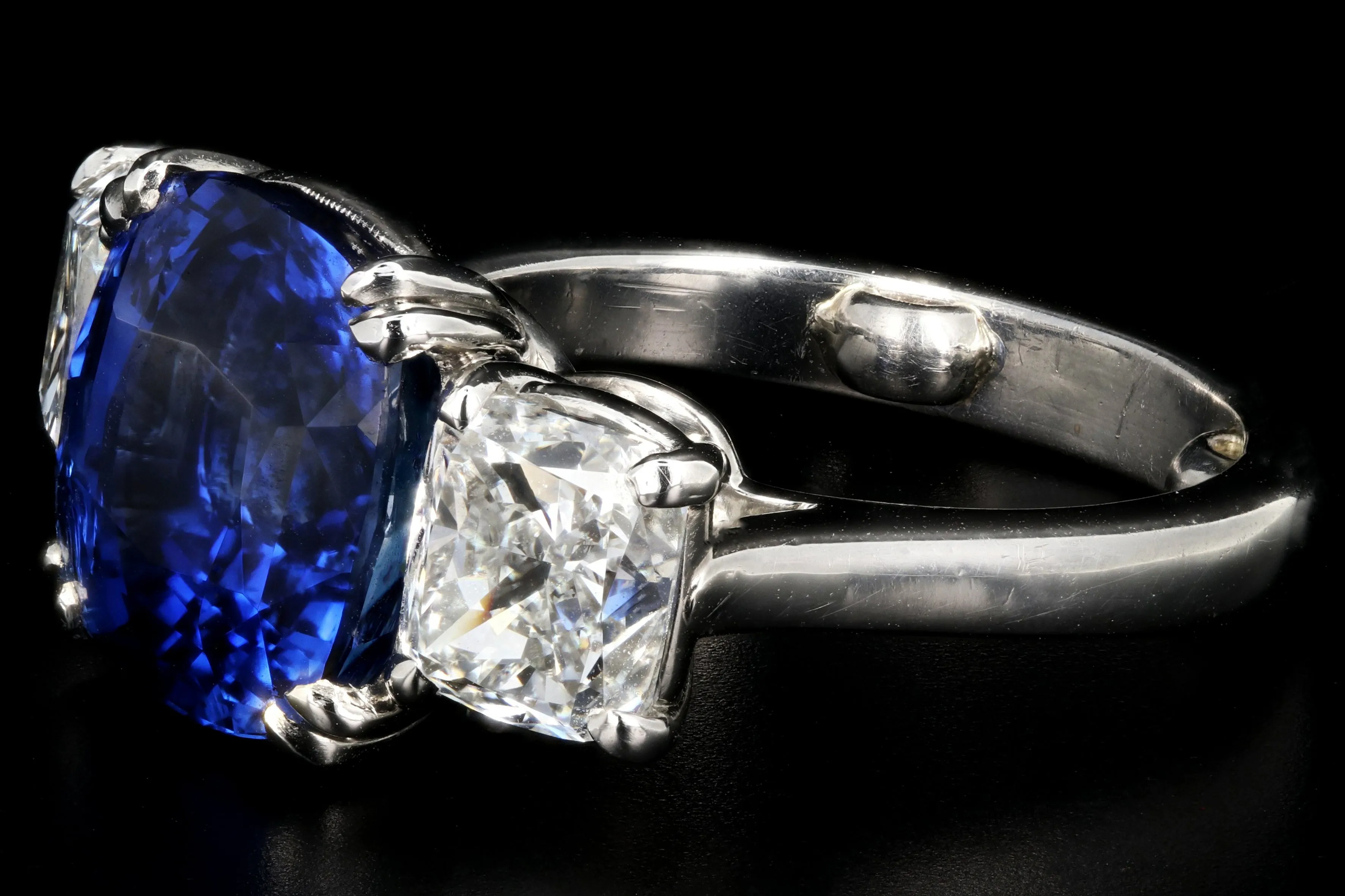 Platinum 7.2ct Madagascar Sapphire Flanked By Two 1.4ct G VS2 Diamonds