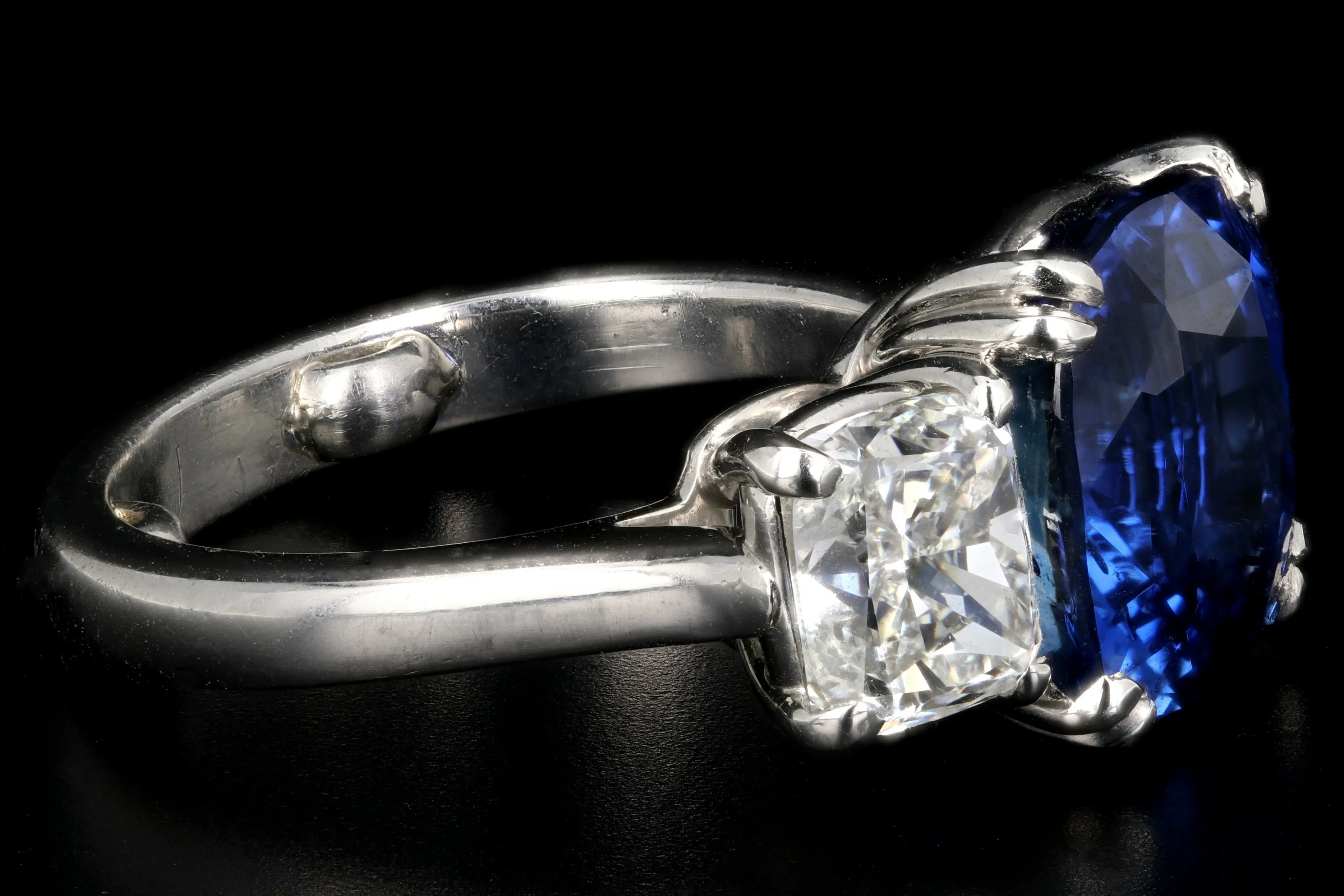 Platinum 7.2ct Madagascar Sapphire Flanked By Two 1.4ct G VS2 Diamonds