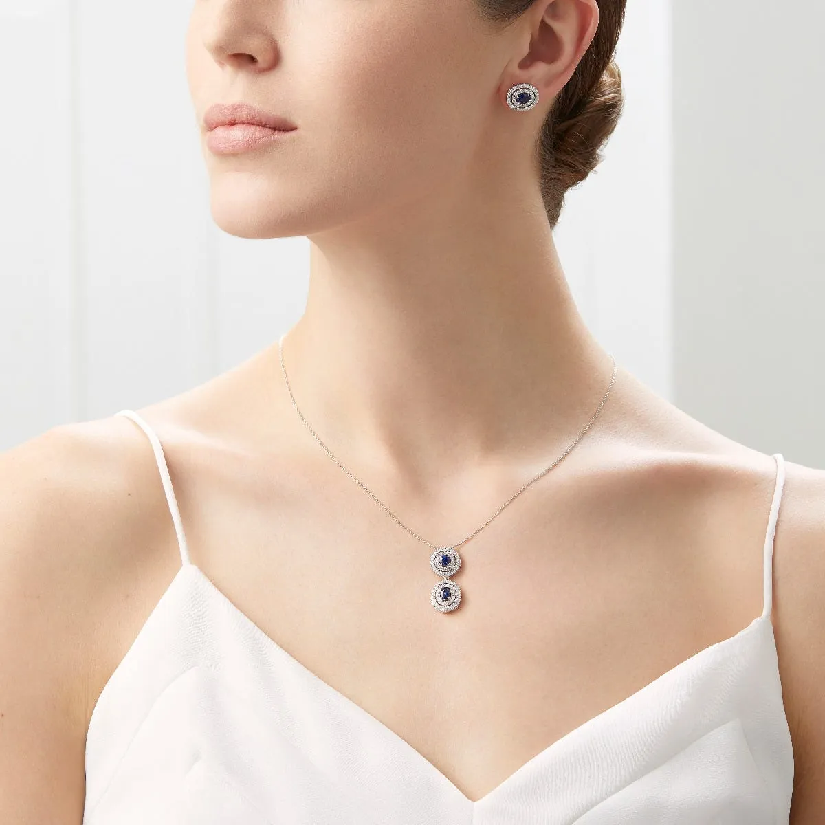 Platinum Pendant with Oval and Round Sapphire and Diamonds