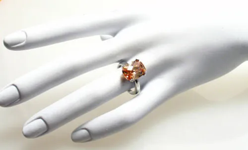 Spectacular Ring with Champagne Colored Rectangular 10x14mm CZ Solitaire in Sterling Silver.
